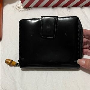 Authentic Gucci Black Wallet with Gold Accent